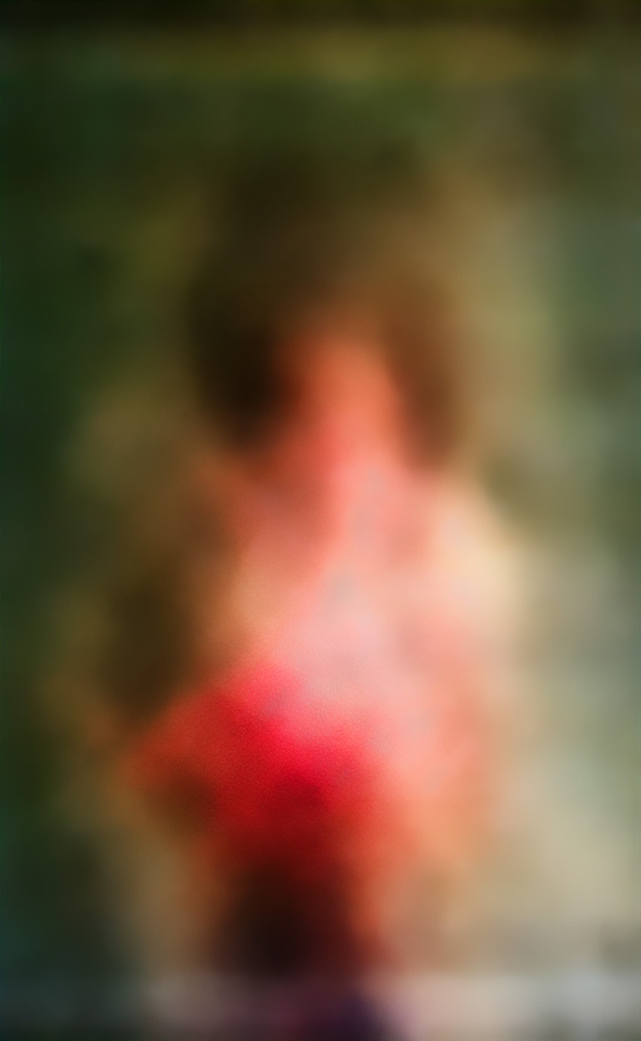 Woman clutching a bouquet